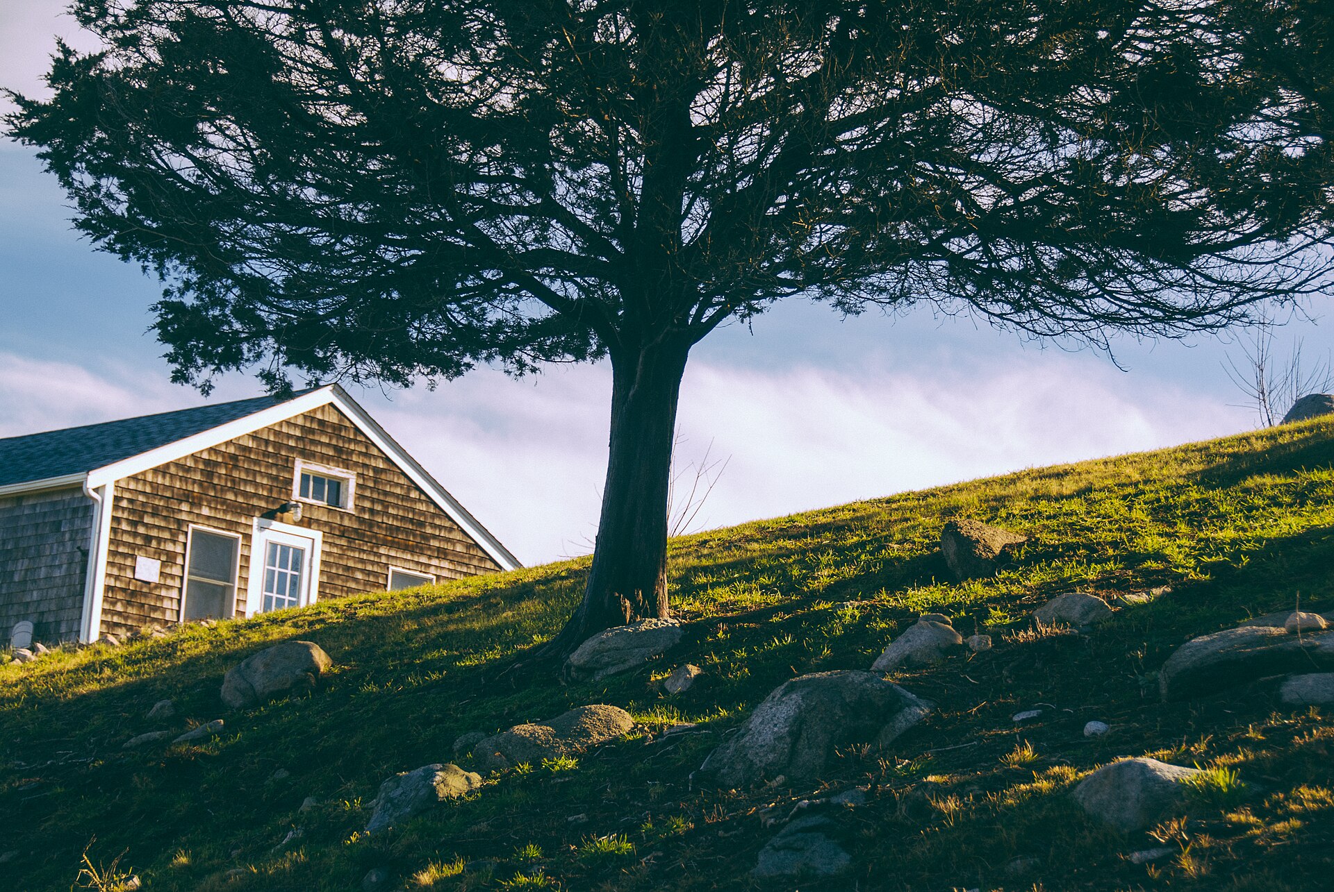 A home set against a broad landscape